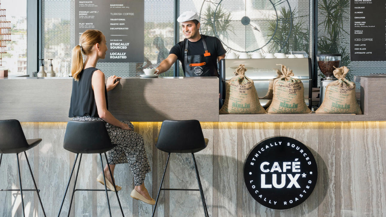 Should I buy or start a cafe